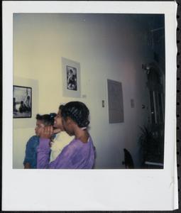 Three girls admiring art