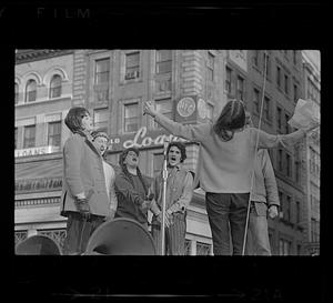 Singing anti-war war songs, downtown Boston