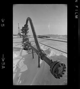 BP Alaska oil pipe, derrick in background