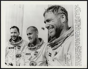 A three-man industry flight crew (L-R) John A. Moyles, 36, Richard Erman, 33, & Norman Abell, 37, step unshaven but healthy from a space chamber 4/12 after a 14-day test of equipment designed to check vital life support equipment for the Apollo spacecraft, which one day will carry men to the moon and back.