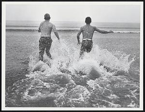 The water was warm they said! They truely went swimming! Gil Shaw of Lynn on Lynn Beach. John Courds of Lynn on Lynn Beach