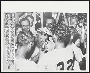 The Dodgers Are a Happy Lot Today--Bill (Moose) Skowron, traded to the Dodgers last winter by the Yankees, is the center of dressing room jubilation in Los Angeles today after the Dodgers beat the Yanks 2-1 to win the 1963 World Series in four straight games. In on the roughhouse are winning pitcher Sandy Koufax (32, foreground), Bob Miller, lower left back to camera; Ron Perranoski, upper left, and Tommy Davis, center background.