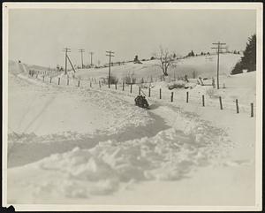 (At right) Nearing the End of a speedy ride over the shining white snowy bobsleigh run at Manoir Richelieu, Murray Bay, P. Q.