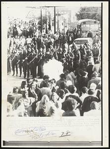 First Gas -- West Virginia State Police were called in yesterday to disburse a crowd of students protesting involvement in Cambodia. For the second day the crowd has blocked this busiest intersection of Morgantown, W. Va.