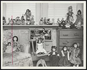 Dolls in All sizes, shapes and costumes reside at the Thomas home.