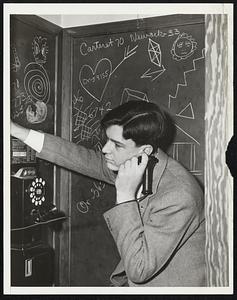 Telephone Booth for Doodlers. West Orange. --This is a telephone booth made especially for doodlers. Its walls are lined with blackboards on which he can make weird signs to his heart's content and perhaps jot down a girl friend's telephone number.