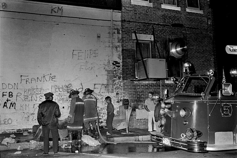 Left to right, Chelsea police officer Jimmy Daley, firefighter Billy Cross, Capt. Archie Resca and firefighter Frank Curran standing next to E1