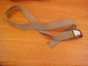 Tan belt with metal buckle