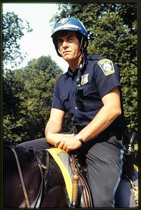 Boston - Boston Common : A mounted patrol officer of the Boston Police sits atop his horse - 1982