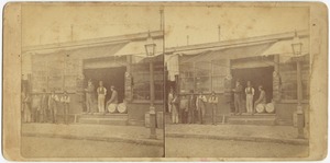 Unidentified grocery with men in front