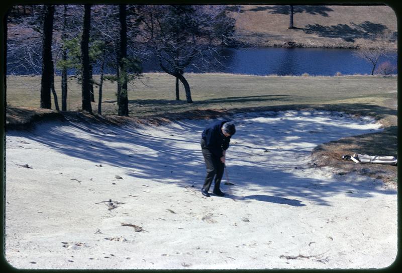 Golfer in sand trap