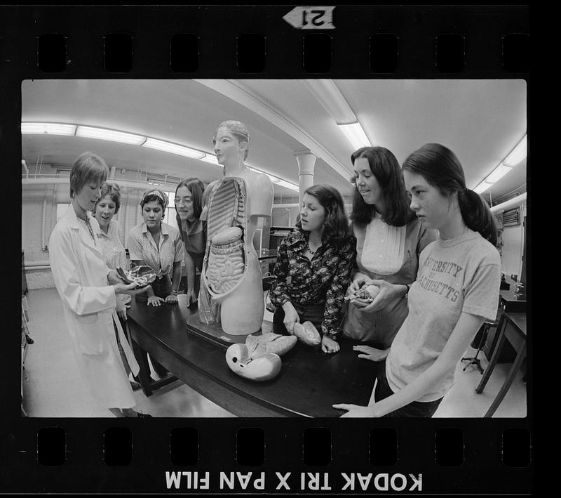 Student nurses learn anatomy using dummy, Boston
