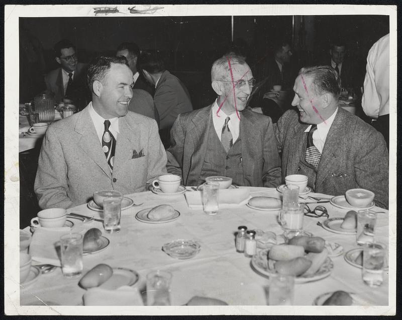 Discussion Of Higher Basketball holds the interest of (left to right) Holy Cross coach Buster Sheary, Oswald Tower, Editor of Basketball Guide and Kansas coach Phog Allen at the weekly basketball luncheon at the Lenox. Sheary and Allen will send their teams against each other tonight at the Garden.