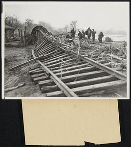 Hadley Area Worst Hit in Massachusetts Flood The main railroad line between Hadley and Northampton, Mass., showing the tracks washed off the road bed and thrown with driftwood and trees that were washed down the river during the height of the recent flood which was the worst in the history of the section. Telephone workmen lay emergency lines through the wreckage. The Hadley area was the most badly damaged section in the state.