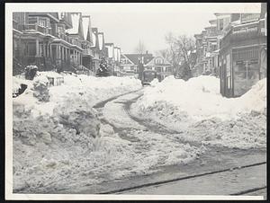 Winterset- Snow covers homes and roadway in Kerwin street, Dorchester.