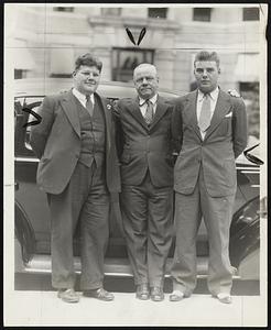 Malcolm E. Nichols, former mayor (centre), with his two sons who were graduated yesterday. Dexter Nichols, 17 (left), was graduated from Boston Latin school with post graduate credits in dramatic arts. Clark Nichols, 20 (right), was graduated from the Huntington school.