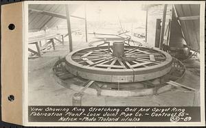 Contract No. 85, Manufacture and Delivery of Precast Concrete Steel Cylinder Pipe, Southborough, Framingham, Wayland, Natick, Weston, view showing ring stretching, bell and spigot ring fabrication plant, Natick, Mass., Nov. 10, 1939