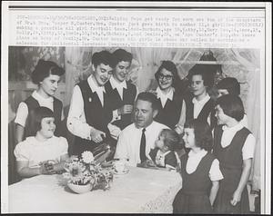 Helping Papa get ready for work are ten of the daughters of Mr. & Mrs. Casper N. Custer