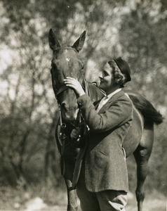 H. Cole with horse