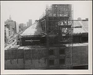 Construction of Boylston Building, Boston Public Library, scaffolding above roofline