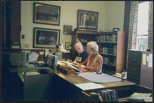 Circulation Desk, left to right: Rose Pixley, Josie Tristany