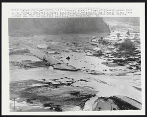 General view of town of Klamath shows that it is almost completely wiped out by flood waters of the Klamath River here 12/24. Left-center is what is left of the downtown section while right-center was the residential section.