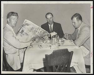 Tribal Pre-Game Meal- Pitcher Herb Score, Infielder George Strickland and Catcher Hank Foiles of Cleveland Indians grab a bite at Hotel Kenmore before heading for Fenway Park and his afternoon's game with Red Sox. Score, brilliant lefthanded strikeout artist, is slated to hurl Sunday for the Tribe.