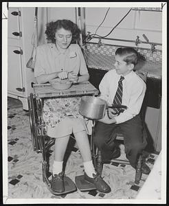 One who was helped by the “March of Dimes” is Mrs. Muriel Broderick, of Dorchester, a polio victim, who is able to carry on her household tasks with the aid of an adjustable wheel chair provided by the dimes sent in to the polio foundation. The last four years have seen the worst polio epidemics in all history, making the necessary for the March of Dimes to move faster than ever.