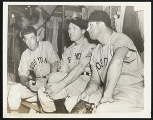 On the Short End. Here are three American Leaguers talking it over in the club house before the All-Star game at Cincinnati July 6, won by the National League Team. Talk was all that Red Ruffing (center) Yankee pitcher got. Roger Cramer (left) of the Boston Red Sox played left field for a while but didn't get a hit or a putout and Jimmy Foxx, another Red Sox, played at first and at third, garnering a single and five putouts. The final score was 4-1.
