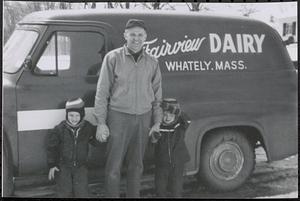 Neal Sanderson with sons David (left) and Keith in front of the Fairview Dairy truck