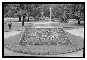 Veterans of Foreign Wars of the United States logo floral design in front of Ether Monument, Public Garden