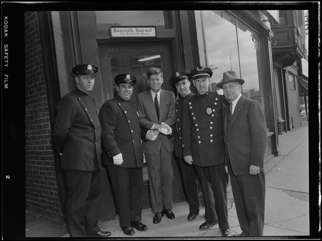 JFK with Somerville cops in front of the Somerville Press during Senate campaign