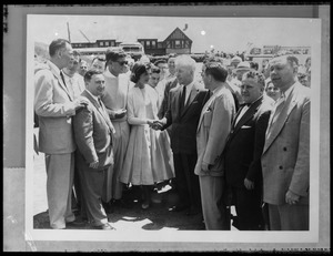 JFK introduces Jackie to Mass. politicians at outing in Hyannisport. Mike Sherry, former speaker of the Mass House is shaking her hand