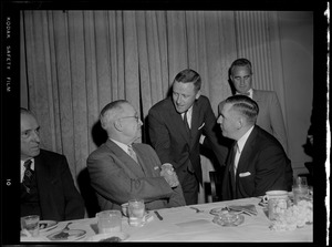 Truman with Furcolo & J. M. Curley shaking hands at Gov. Furcolo's breakfast for Truman at the University Club
