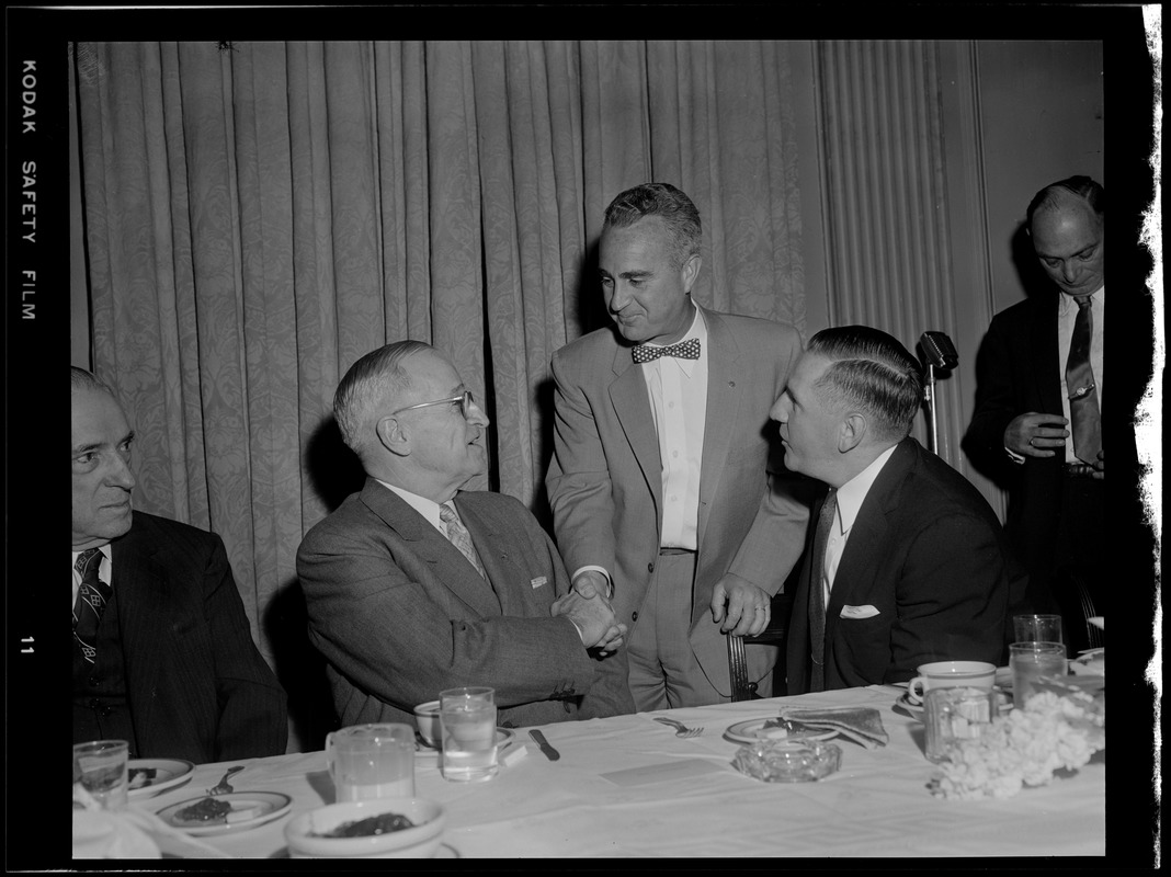 Truman with Furcolo & J. M. Curley shaking hands at Gov. Furcolo's breakfast for Truman at the University Club