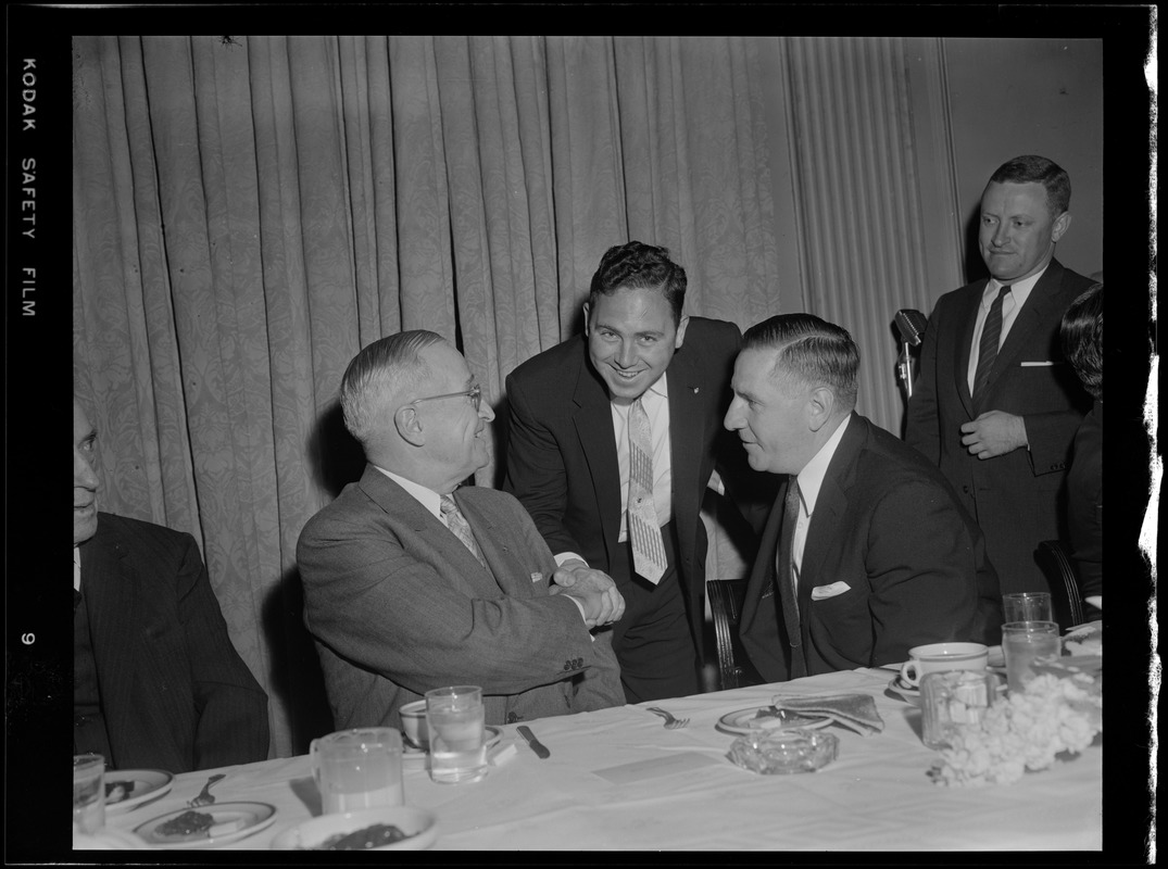 Truman shaking hands at Furcolo's University Club breakfast for Truman