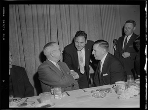 Truman shaking hands at Furcolo's University Club breakfast for Truman