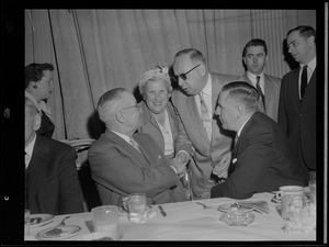 Truman shaking hands at Gov. Furcolo's breakfast for Truman at the University Club