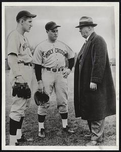 Preparing For The Eagles, who go to Worcester tomorrow for their annual Memorial Day game, Coach Jack Barry of Holy Cross (right), goes over the hitters with pitcher Johnny Tivnan of Worcester (left) and Harper Gerry of Shelburne Falls.