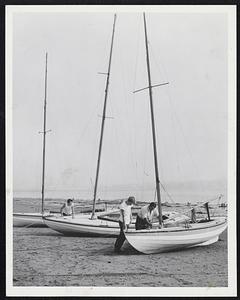 Taking No Chances with Hurricane Ione are these folks on the South Shore. Left, two sailboats are hauled up on land and secured at Wallaston Beach.