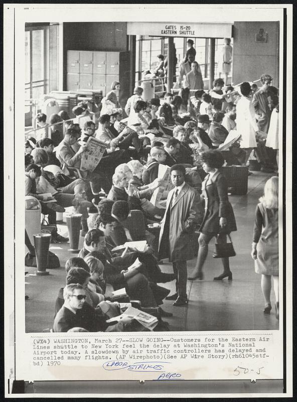 Washington – Slow Going – Customers for the Eastern Air Lines shuttle to New York feel the delay at Washington’s National Airport today. A slowdown by air traffic controllers has delayed and cancelled many flights. Labor Strikes. Aero.