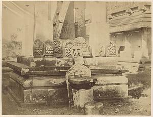 Naga stones at base of Brahma-stambha at Jain temple complex in Guruvayanakere, India