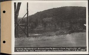 Contract No. 51, East Branch Baffle, Site of Quabbin Reservoir, Greenwich, Hardwick, looking northerly at borrow area and quarry from south side of Hardwick Road near watertank, east branch baffle, Hardwick, Mass., Jul. 8, 1936