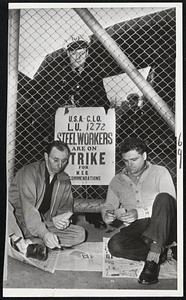 Steel Union Pickets Steven Patak, left, and Harold Scheller occupy themselves at cards at the Jones and Laughlin steel mill in Pittsburgh, Pa., The mill was shut down after steel workers struck throughout the nation.
