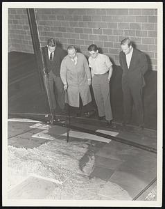 Dr. Wallace Atwood, director of the map construction, points to the location of the Custom's House tower as three Institute students look on. Left to right: Neil McLean of Binghamton, N.Y., Dr. Atwood; Boardman Lockwood of Hartford; and Emerson Kirby of New Haven. Up to a few years ago no suitable maps had been made of certain sections of New England and Pennsylvania. Hence the unfilled gaps. Dr. Atwood says these will be filled soon by using modern aeronautical charts.