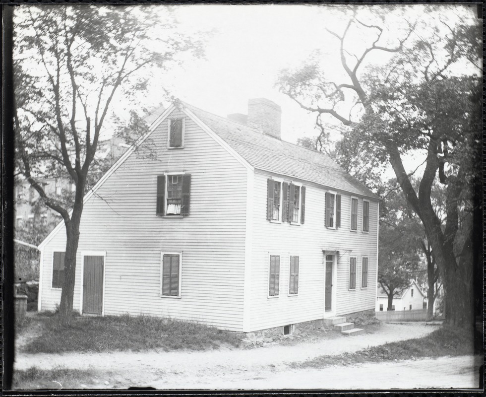 Exterior view of a wooden house with shutters - Digital Commonwealth