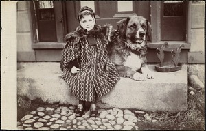 Girl seated with dog