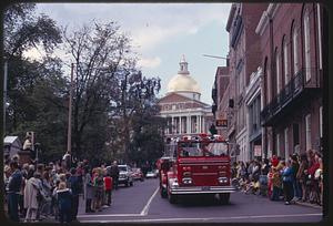 Fire engine in parade on Park Street, Boston
