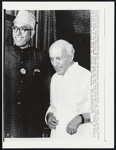 New Delhi, India: Prime Minister Jawaharlal Nehru of India (R) greets former Prime Minister Sheikh Abdullah of Kashmir, who has just been released from prison, here, 4/30. Abdullah, jailed by his government for 10 years, met with Nehru to discuss the future of Kashmir and expressed optimism about the results of the meeting.