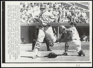 Eludes Tag -- John Tagliarino, Tampa, Florida Little League outfielder, eludes tag of Mike Quinn, Santa Clara, Calif. catcher in 3rd inning of 5th game of Little League World Series at Williamsport. as he scores. Tagliarino scored from second on teammates single. Santa Clara won 4-3.